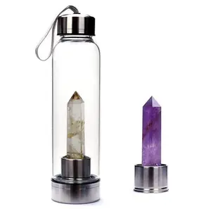 Image of Energy healing crystal water bottle with crystal point inside elixir drinking water bottle