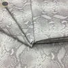 China Wholesale Top Quality Twinkle Finished Snake Pattern Embossed Cow Skin Real Leather for Shoes and Bags