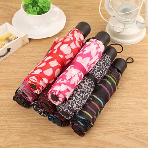 Image of Factory wholesale solid color folding umbrellas color grid mini three folding umbrellas advertising gift umbrellas