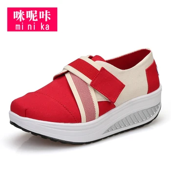 white canvas running shoes