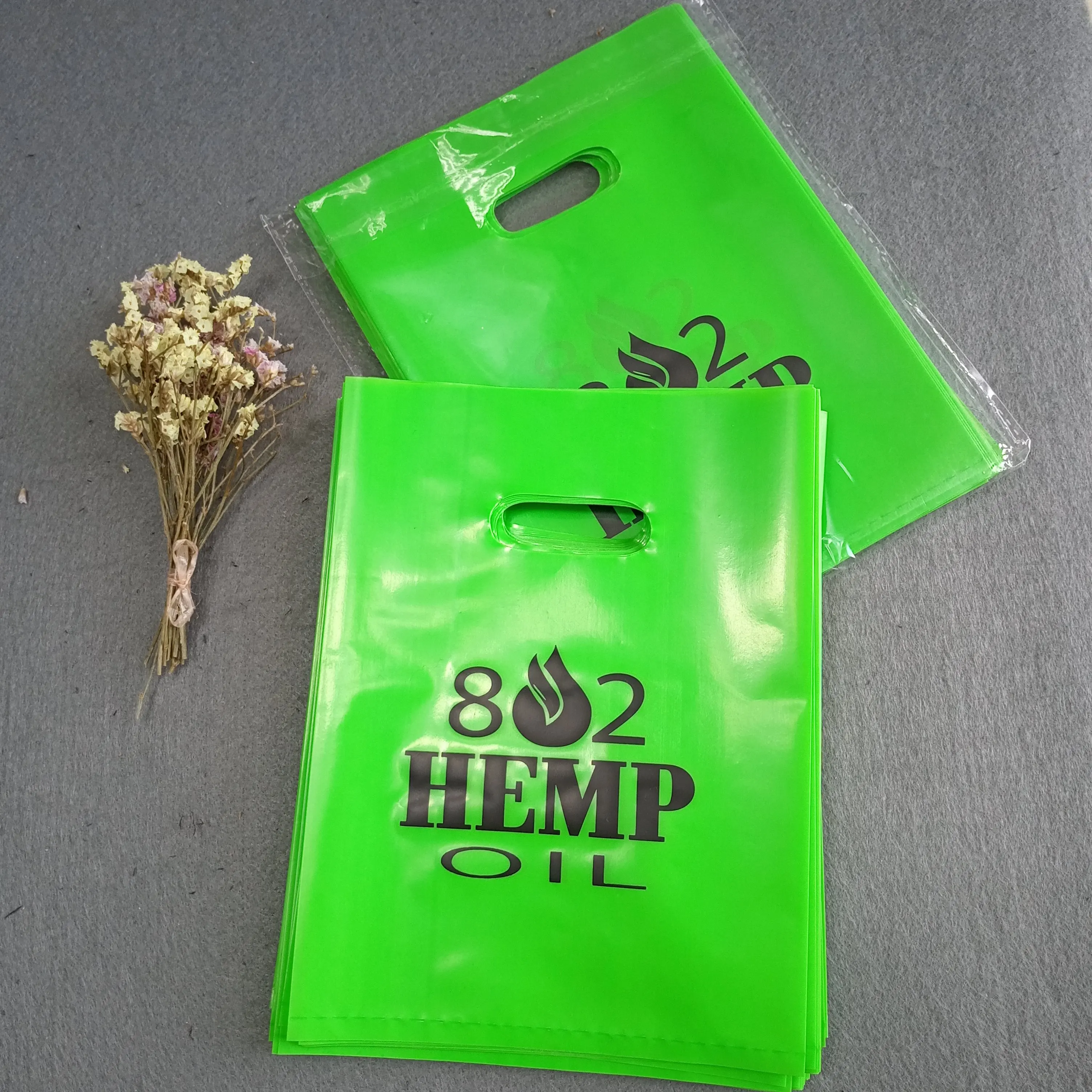 

Wholesale LDPE Carrier Die Cut Handle Plastic Shopping Bag With Logo, Customized color