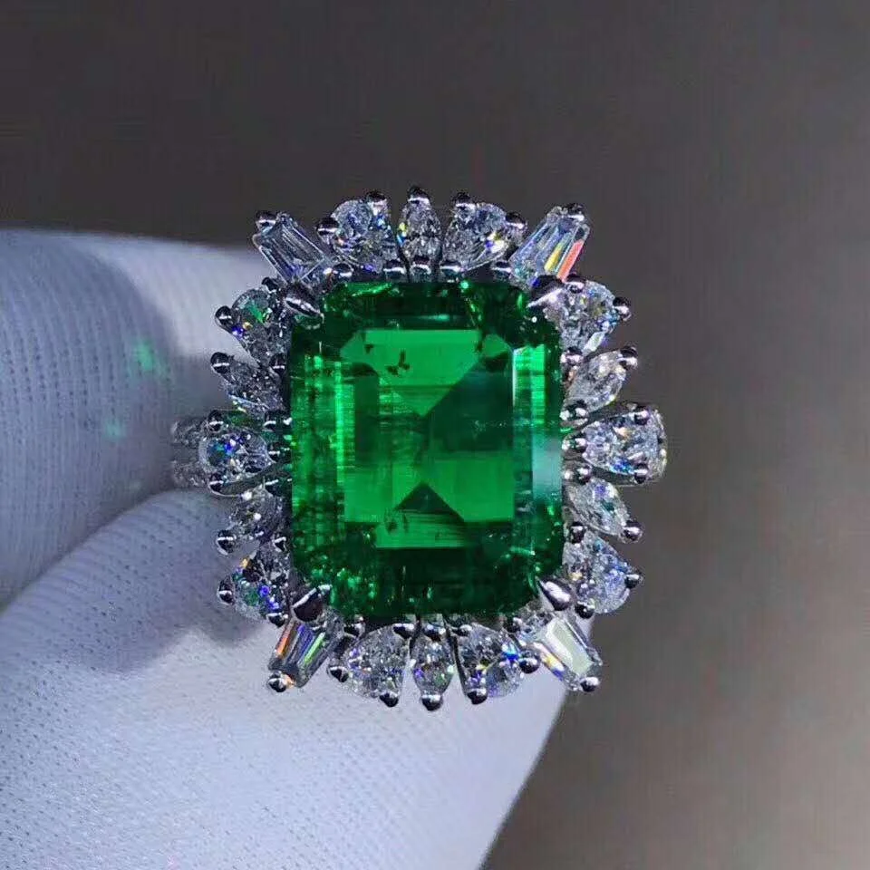 

Custom Design Wedding Ring 18k Solid White Gold Moissanite and Emerald Ring