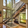 Fashionable and durable cherry wood floors and stairs with iron posts