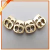 Shiny gold metal adjustable toggles for clothing