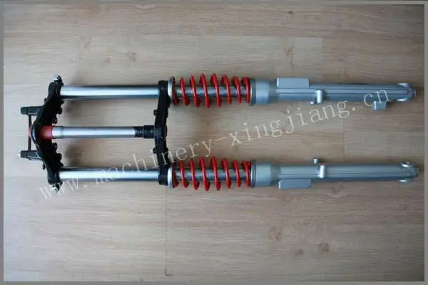 Front shock absorber for tricycle