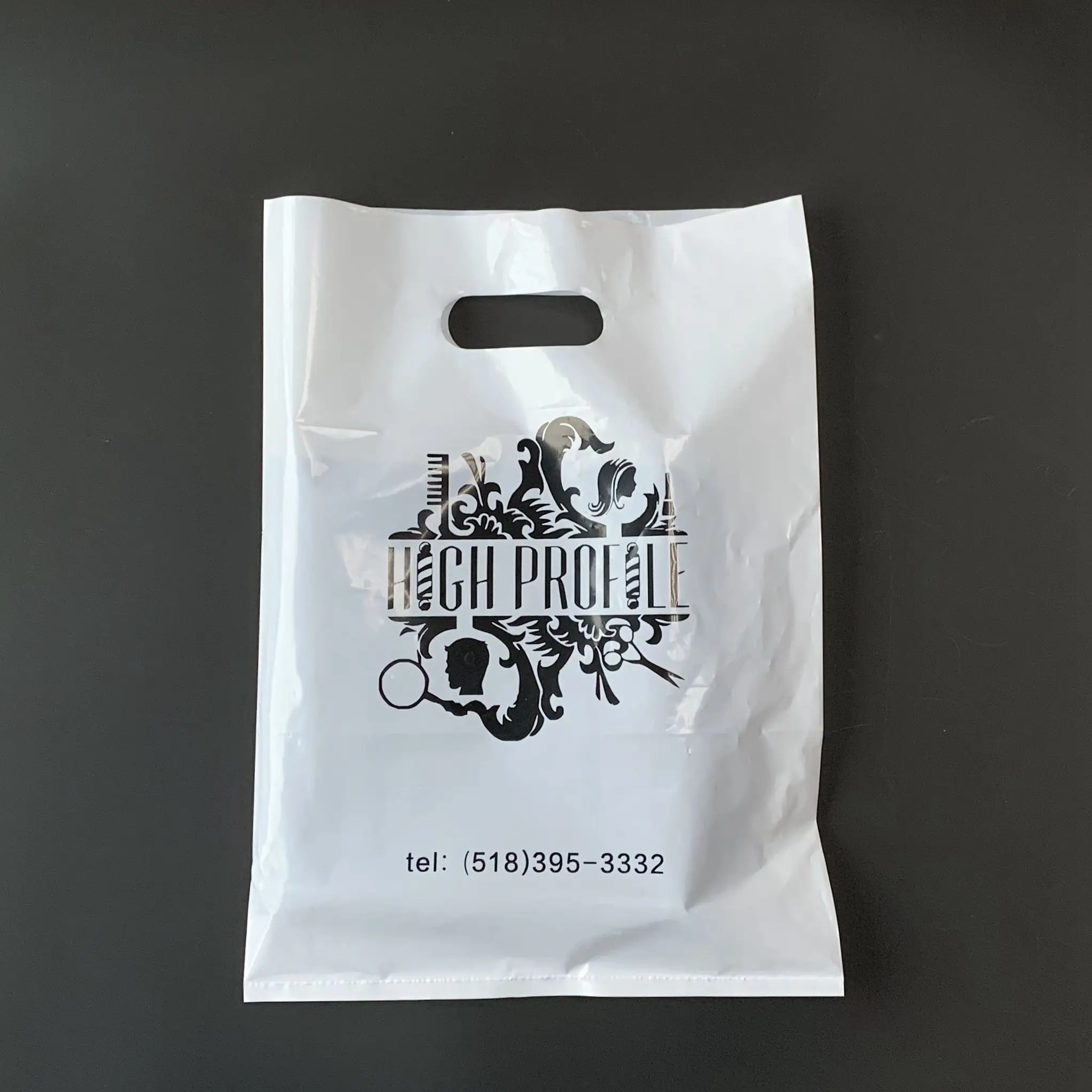 

Guangzhou factory custom design Logo Print Biodegradable die cut Shopping Plastic packaging bag, Customized color