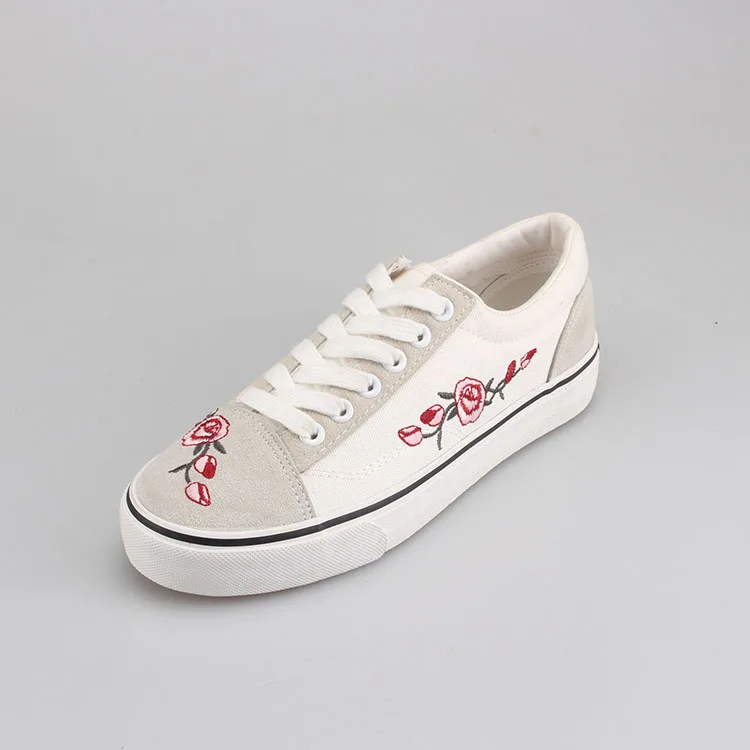 ladies white canvas plimsolls