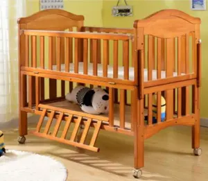 baby sleeping wooden bed