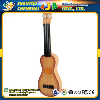 miniature toy guitar