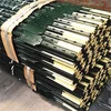 Green T post with spade
