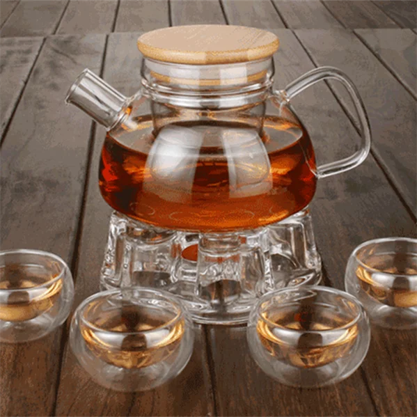 

Heat- resistant glass teapot with warmer and cups Tea Set, Clear