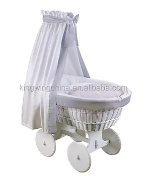 wicker baby bassinet on wheels