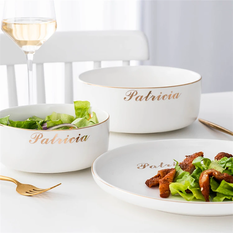 Wholesale tableware custom logo gold rim black ceramic dinnerware set for restaurant