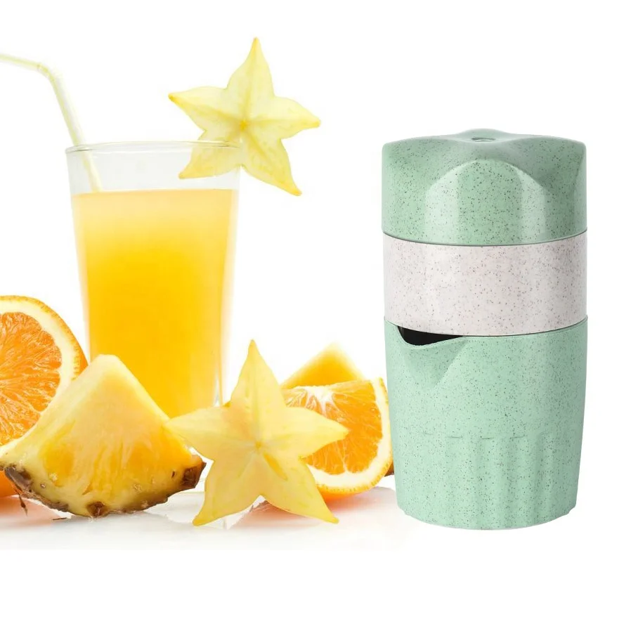 

Plastic manual hand citrus juicer portable, Green and white