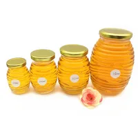 

100ml 200ml 350ml 750ml honeycomb glass honey jar with metal lid wholesale