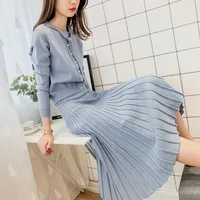 

Fashionable Young girls pearl cardigan and long skirt knit twin set