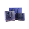 /product-detail/glossy-laminated-blue-color-custom-made-logo-printing-shopping-fancy-paper-gift-bags-60715172127.html