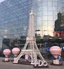 Huge statue of the Eiffel Tower in shopping square sculpture