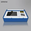 Customer laser engraver for buttons ,make logo for jeans etc small home business