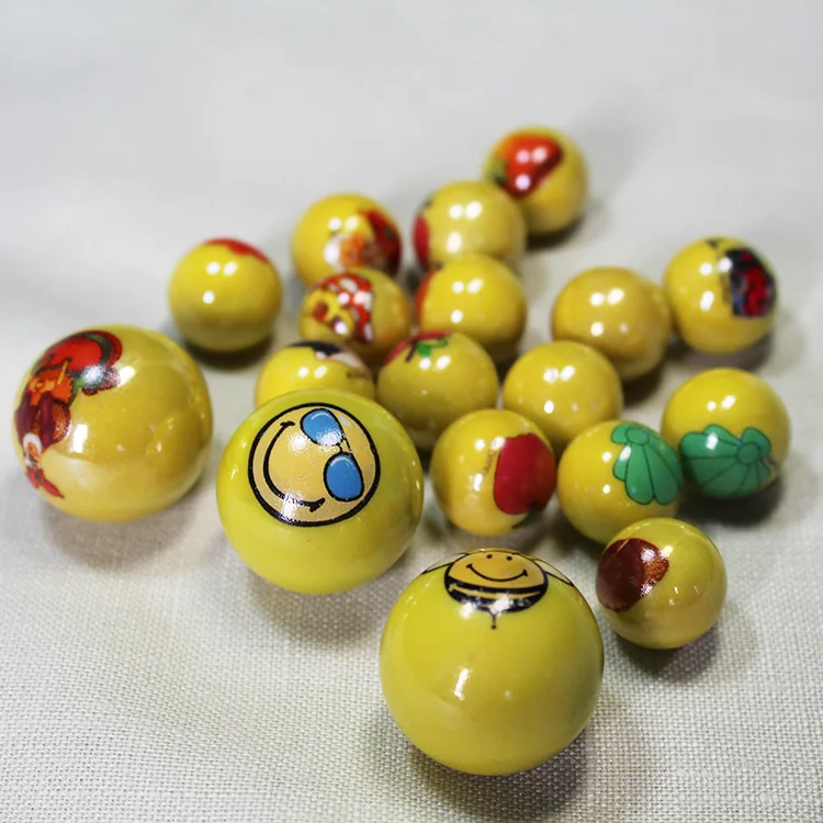 
Custom yellow 16mm glass marbles for children play printed marble 