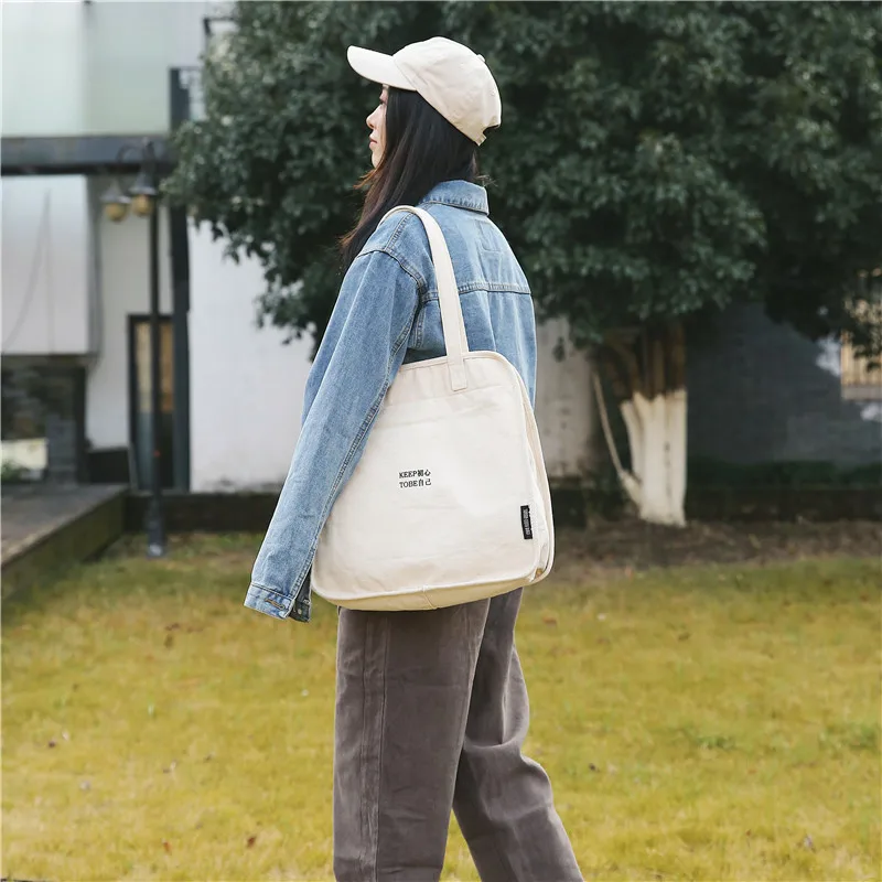 

New design fashion durable leisure large capacity women canvas material shoulder bag, White/black or customized