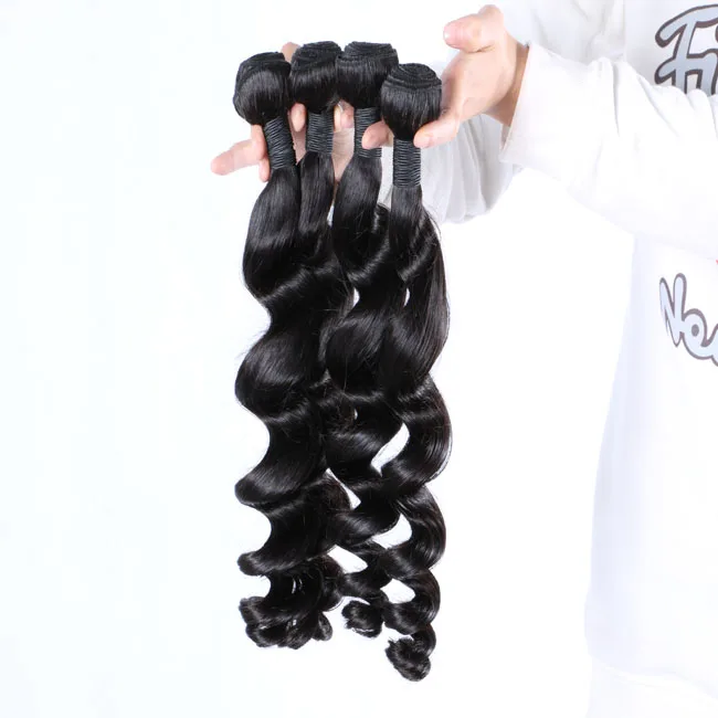 

human hair weft,natural color loose wave 9A grade 100% virgin hair no tangle and no shedding.