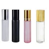CosmeticFrosted clear black 10ml glass essential oil roller bottle with gold silver black bamboo lid stainless steel roller ball