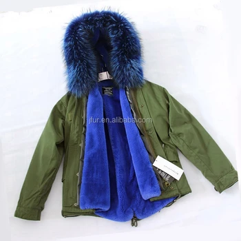 green coat with blue fur hood