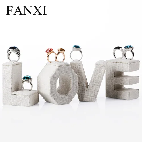 

FANXI Custom Romantic Wooden LOVE Letter Wedding Ring Display Jewelry Stand Sets Linen Jewelry Display, Creamy white/coffee available or custom