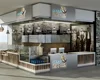 Modern shopping mall cafe and food kiosk design with wood display counter