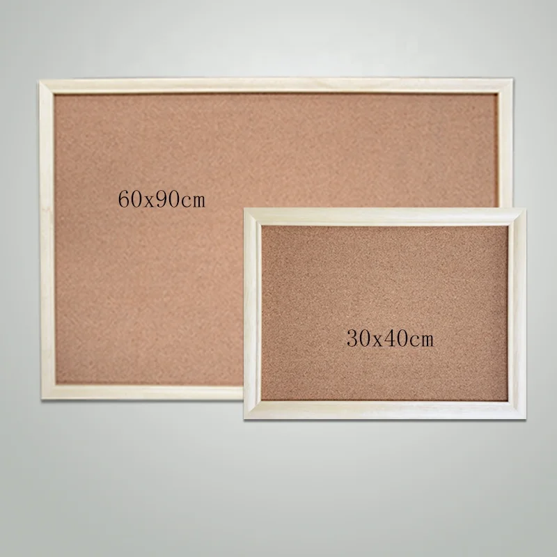 
Staples cork board with wood color frame on wall for sell 