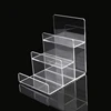 custom acrylic clear four tier table top display stand for wallet, phone, bottle display