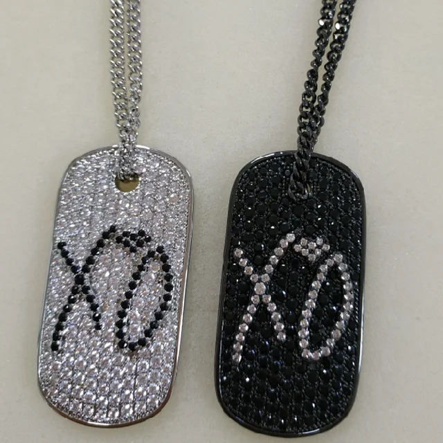 

Iced out xo dog tags with cuban chain necklace