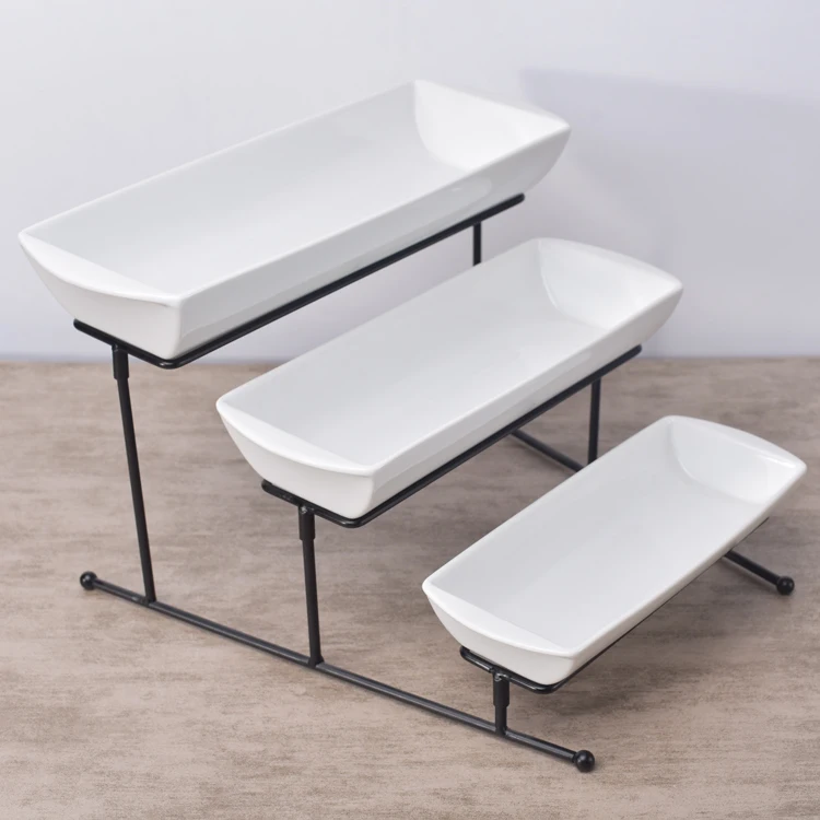 Ordinary fruit salad serving long deep white dinner food restaurant ceramic plates dishes .jpg