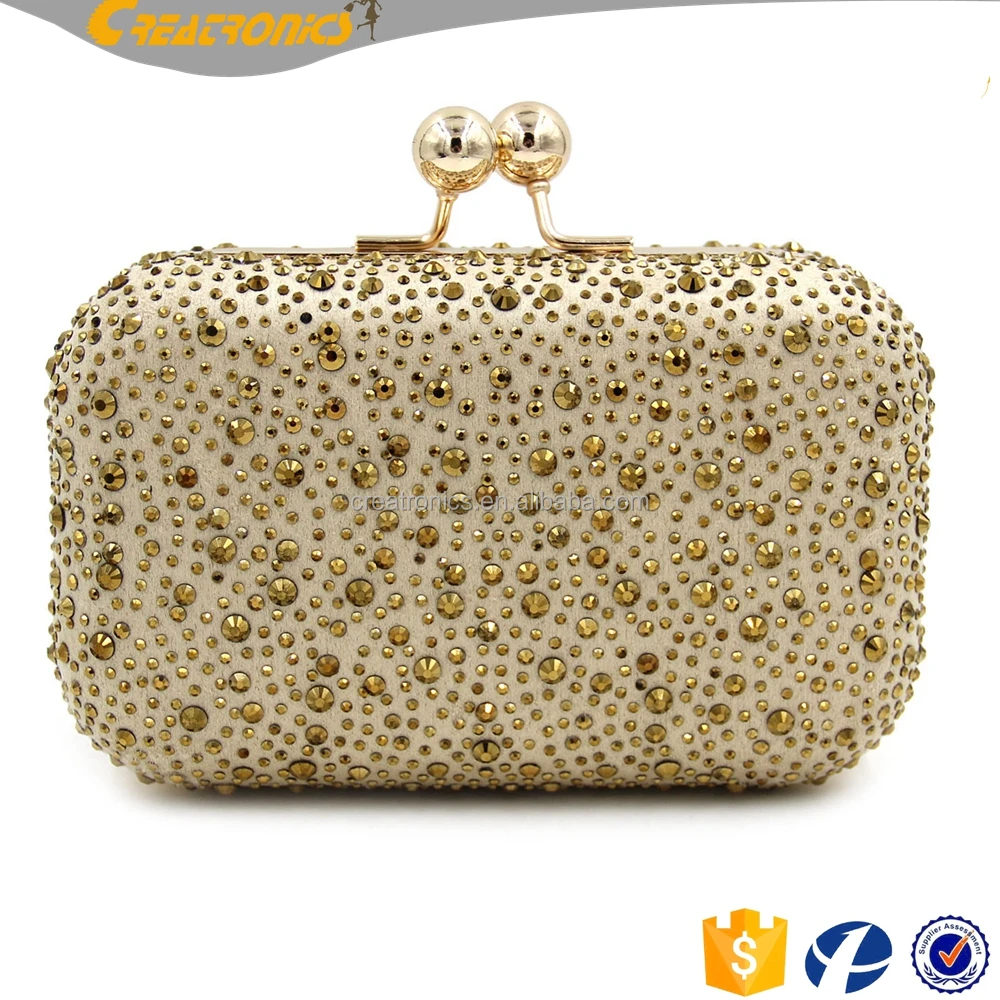 gold colour clutch bag