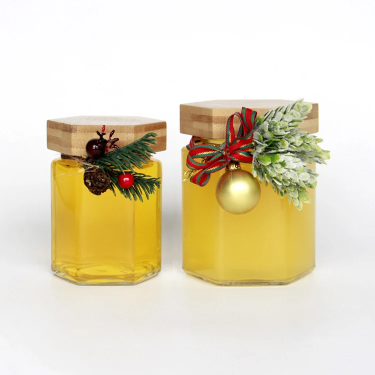 

Hot selling Bee Shape 100ml 200ml 400ml Hexagonal Glass Honey Jar with Bamboo Lid