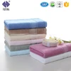 Guangzhou manufacturer 100% cotton logo customized plain colour satin face/bath towel