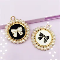 

Wholesale DIY black white enamel pearl bow charm pendant