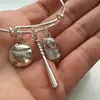 Baseball Bracelet with bat baseball softball and baseball cap charms silver tone bangles