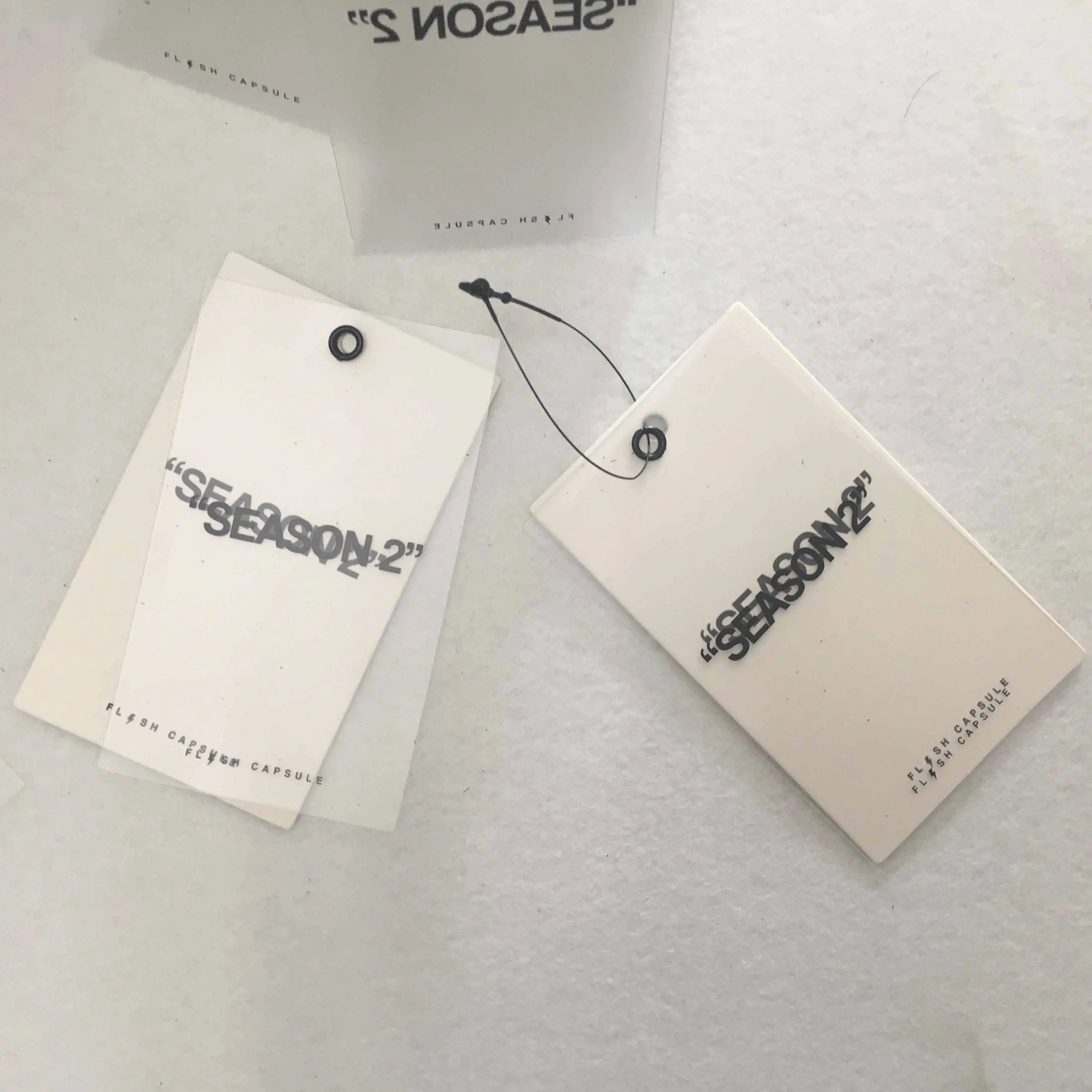 

Factory Luxury thick pvc and paper logo print hang tag black eyelet paper tag for sweaters, Cmyk