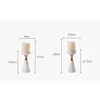 Neoclassical metal adornment places article candlestick