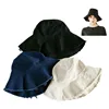 outdoor black blue ivory folding ladies wide brim sun hats for women visor plain lady bucket hat with tassel