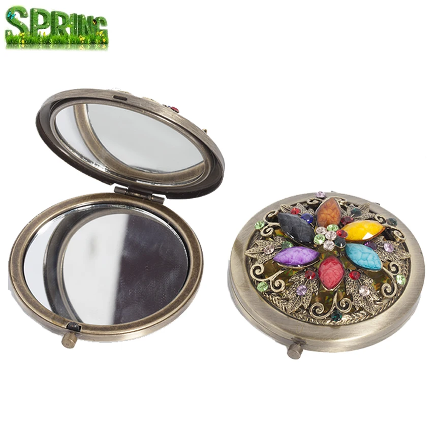 

vintage bronze hollow out logo mirror fancy decorative folding compact mirror
