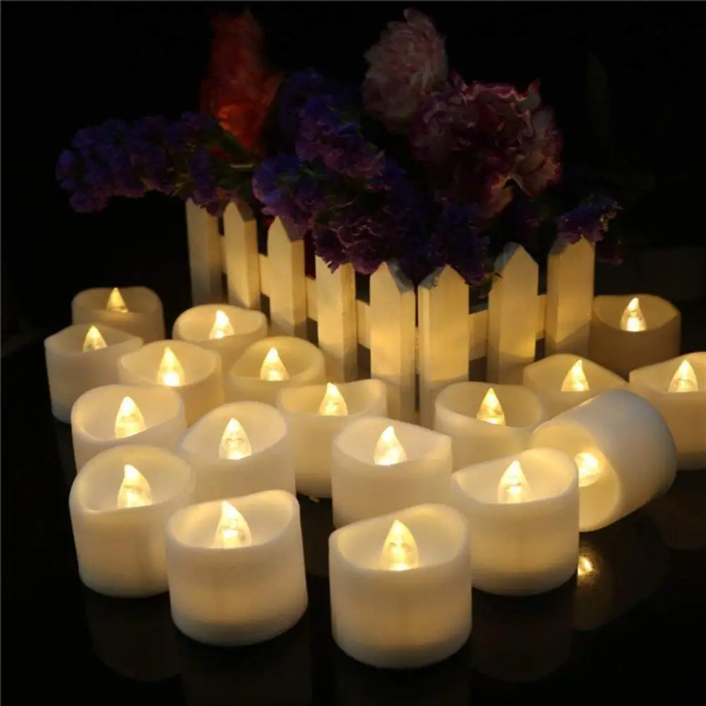 

24 Pack Flickering LED Tea Lights in warm white light