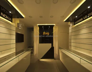 Small Warm Decorated Mobile Phone Shop Interior Design With Glass Accessories Display Shelves And Counter Buy Mobile Phone Shop Interior