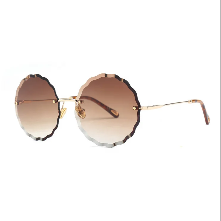 

Trendy Rimless Women sun glasses Lace Gradient Lens Round Metal Temple Sunglasses 2019