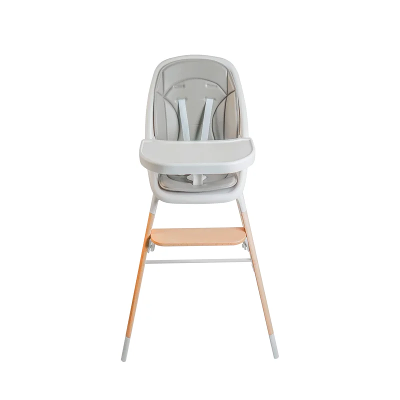 baby rocking in high chair
