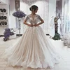 Sparkly Ball Gown Wedding Dresses 2019 Turkey Tassel Short Sleeves Keyhole Lace Up Back Wedding Gowns