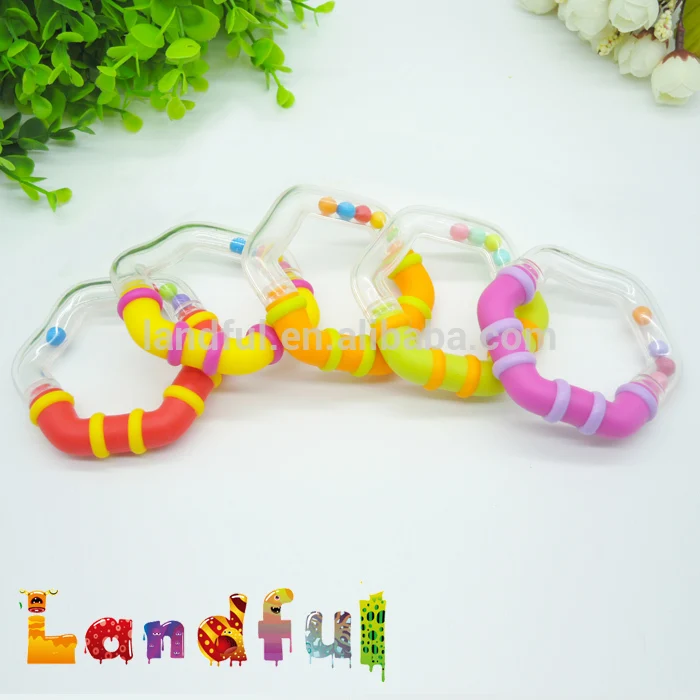 Wholesale Colourful Bpa Free Baby Relief Silicone Ring Rattle Insert Teether Toy For Gift