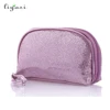 Paillette adorns gold shell-shaped make up cosmetic bags for women